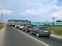 Warten vorm Bahnschranken